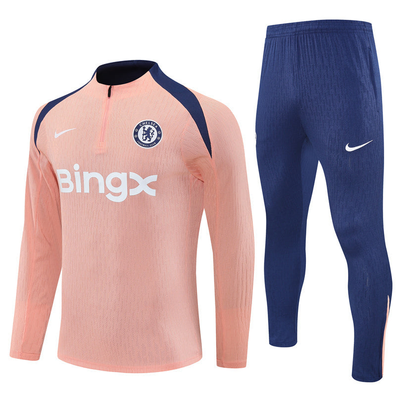 Chelsea trainingspak 2025/26, babyroze, met 1/4 rits.